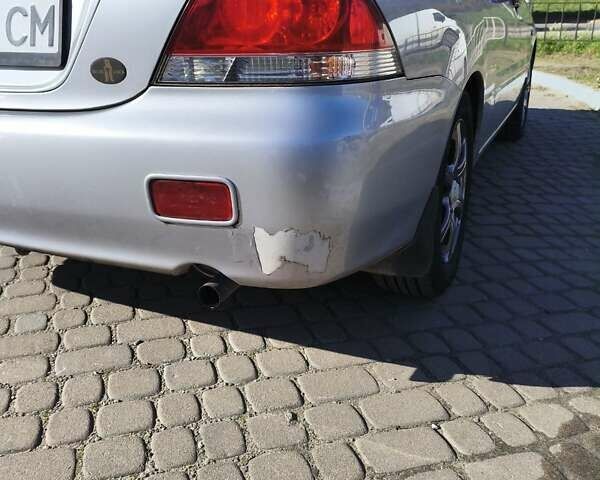 Сірий Міцубісі Lancer, об'ємом двигуна 1.58 л та пробігом 320 тис. км за 3700 $, фото 6 на Automoto.ua