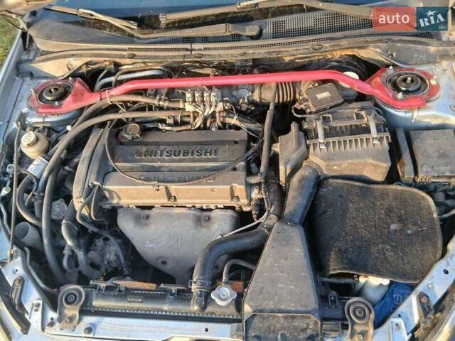 Серый Мицубиси Лансер, объемом двигателя 2 л и пробегом 300 тыс. км за 2850 $, фото 3 на Automoto.ua