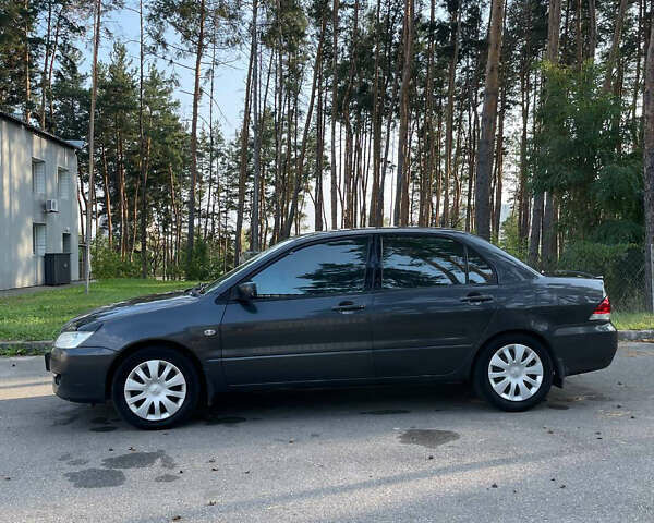 Сірий Міцубісі Lancer, об'ємом двигуна 1.6 л та пробігом 320 тис. км за 5000 $, фото 7 на Automoto.ua