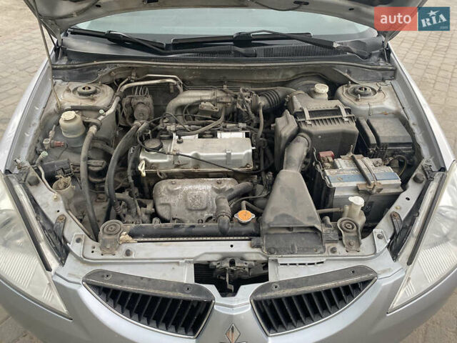 Сірий Міцубісі Lancer, об'ємом двигуна 1.58 л та пробігом 268 тис. км за 3799 $, фото 8 на Automoto.ua