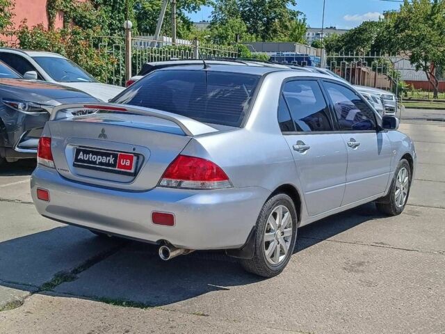 Сірий Міцубісі Lancer, об'ємом двигуна 1.6 л та пробігом 284 тис. км за 4330 $, фото 7 на Automoto.ua