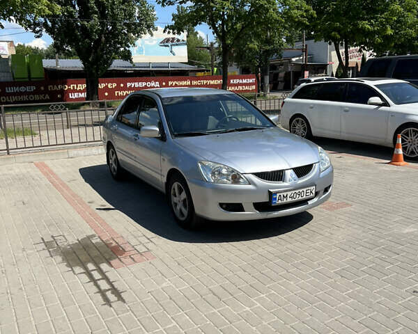 Сірий Міцубісі Lancer, об'ємом двигуна 1.6 л та пробігом 210 тис. км за 4500 $, фото 1 на Automoto.ua