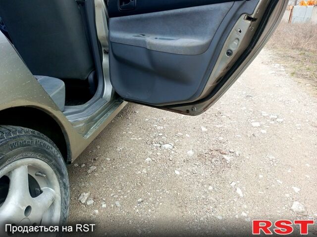Сірий Міцубісі Lancer, об'ємом двигуна 1.3 л та пробігом 223 тис. км за 4300 $, фото 13 на Automoto.ua