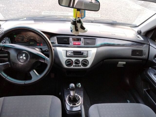 Сірий Міцубісі Lancer, об'ємом двигуна 1.6 л та пробігом 177 тис. км за 4500 $, фото 2 на Automoto.ua