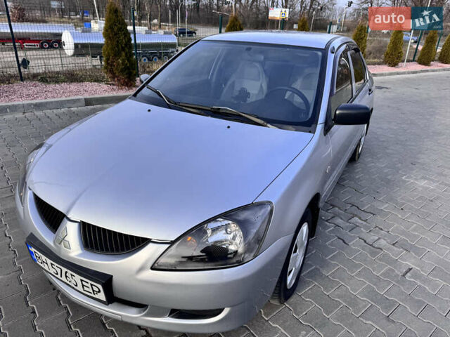 Сірий Міцубісі Lancer, об'ємом двигуна 1.3 л та пробігом 450 тис. км за 2850 $, фото 8 на Automoto.ua