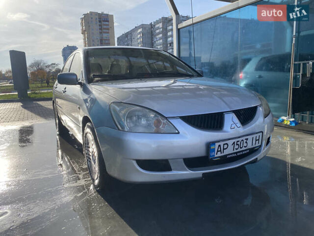 Сірий Міцубісі Lancer, об'ємом двигуна 1.3 л та пробігом 376 тис. км за 3700 $, фото 1 на Automoto.ua