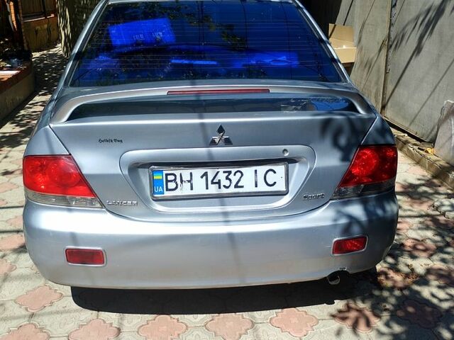 Сірий Міцубісі Lancer, об'ємом двигуна 1.6 л та пробігом 308 тис. км за 3500 $, фото 7 на Automoto.ua