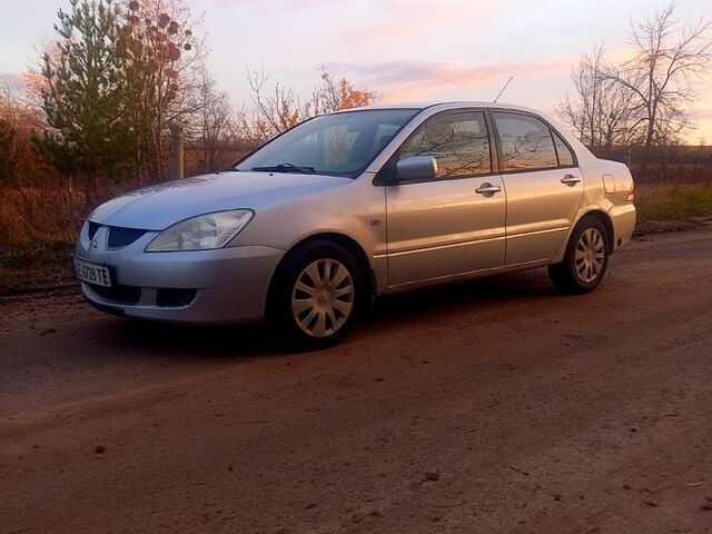 Сірий Міцубісі Lancer, об'ємом двигуна 1.6 л та пробігом 280 тис. км за 3700 $, фото 3 на Automoto.ua