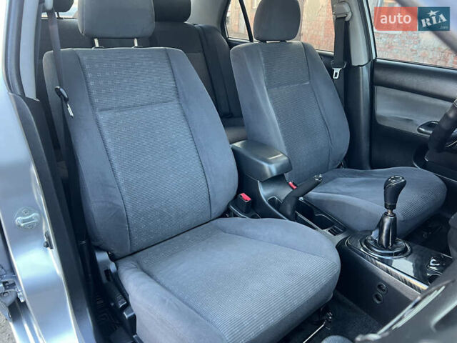 Серый Мицубиси Лансер, объемом двигателя 1.6 л и пробегом 320 тыс. км за 3650 $, фото 31 на Automoto.ua