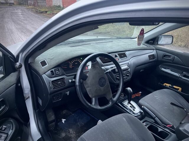 Серый Мицубиси Лансер, объемом двигателя 1.6 л и пробегом 315 тыс. км за 2950 $, фото 4 на Automoto.ua