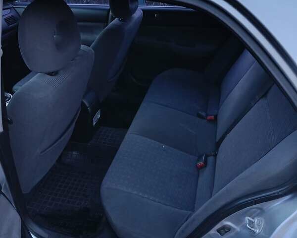 Мицубиси Лансер 2004 в Черновцах на Automoto.ua Серый Мицубиси Лансер, объемом двигателя 1.58 л и пробегом 439 тыс. км за 2750 $, фото 20 на Automoto.ua