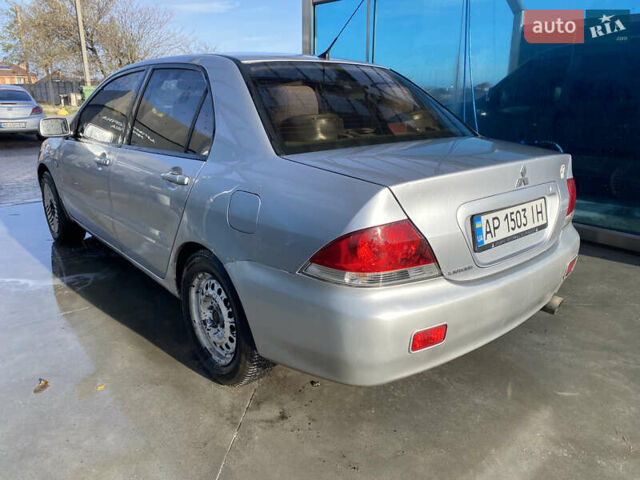 Сірий Міцубісі Lancer, об'ємом двигуна 1.3 л та пробігом 376 тис. км за 3700 $, фото 5 на Automoto.ua