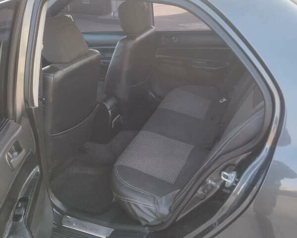 Сірий Міцубісі Lancer, об'ємом двигуна 1.58 л та пробігом 360 тис. км за 4000 $, фото 15 на Automoto.ua