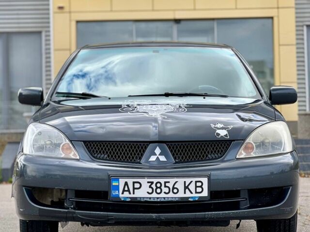 Серый Мицубиси Лансер, объемом двигателя 1.6 л и пробегом 490 тыс. км за 1799 $, фото 2 на Automoto.ua