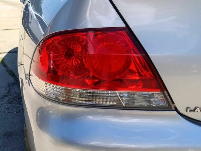 Сірий Міцубісі Lancer, об'ємом двигуна 1.6 л та пробігом 284 тис. км за 4330 $, фото 9 на Automoto.ua