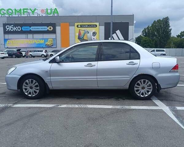 Сірий Міцубісі Lancer, об'ємом двигуна 1.6 л та пробігом 242 тис. км за 4300 $, фото 1 на Automoto.ua