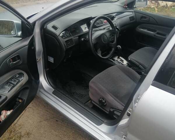Міцубісі Lancer 2004 у Харкові на Automoto.ua Сірий Міцубісі Lancer, об'ємом двигуна 1.58 л та пробігом 248 тис. км за 3550 $, фото 1 на Automoto.ua