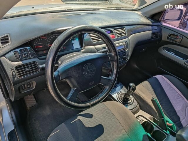 Мицубиси Лансер 2004 в Харькове на Automoto.ua Серый Мицубиси Лансер, объемом двигателя 1.6 л и пробегом 284 тыс. км за 4990 $, фото 20 на Automoto.ua