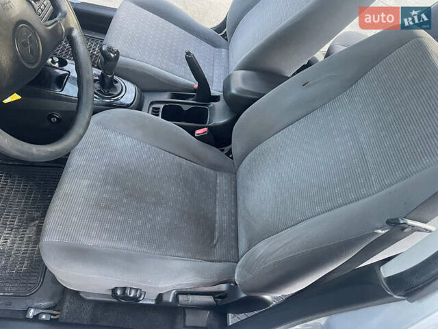 Сірий Міцубісі Lancer, об'ємом двигуна 1.58 л та пробігом 271 тис. км за 3000 $, фото 19 на Automoto.ua