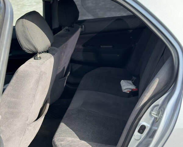 Сірий Міцубісі Lancer, об'ємом двигуна 1.6 л та пробігом 260 тис. км за 3899 $, фото 9 на Automoto.ua