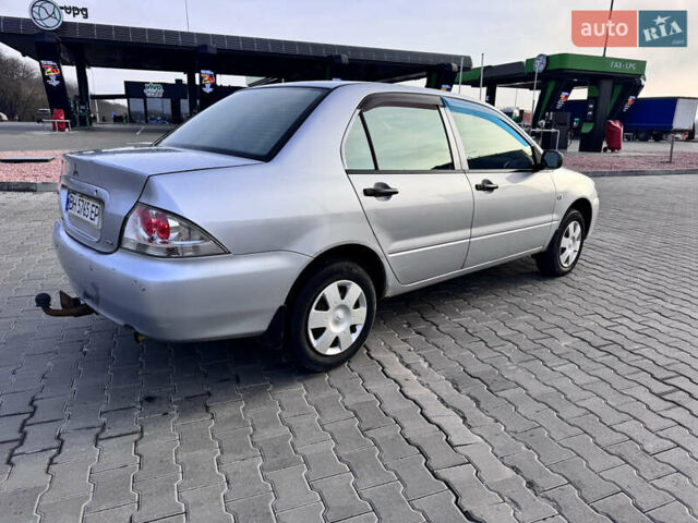 Сірий Міцубісі Lancer, об'ємом двигуна 1.3 л та пробігом 450 тис. км за 2650 $, фото 6 на Automoto.ua