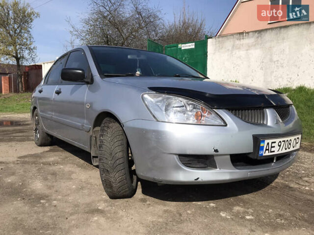 Мицубиси Лансер 2004 в Днепре (Днепропетровске) на Automoto.ua Серый Мицубиси Лансер, объемом двигателя 1.59 л и пробегом 294 тыс. км за 4699 $, фото 1 на Automoto.ua