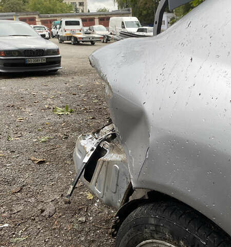 Сірий Міцубісі Lancer, об'ємом двигуна 1.58 л та пробігом 270 тис. км за 1999 $, фото 18 на Automoto.ua