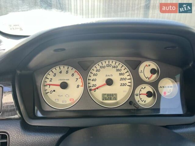 Сірий Міцубісі Lancer, об'ємом двигуна 1.58 л та пробігом 262 тис. км за 3900 $, фото 8 на Automoto.ua