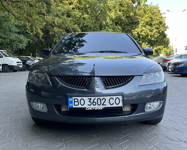 Сірий Міцубісі Lancer, об'ємом двигуна 1.58 л та пробігом 300 тис. км за 3800 $, фото 1 на Automoto.ua