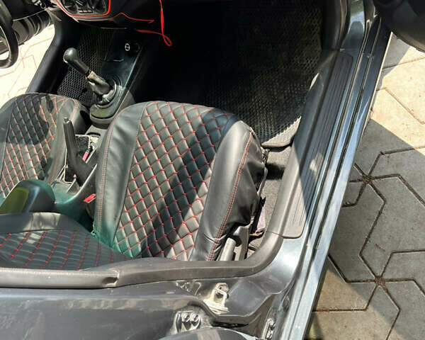 Сірий Міцубісі Lancer, об'ємом двигуна 1.58 л та пробігом 300 тис. км за 3800 $, фото 9 на Automoto.ua
