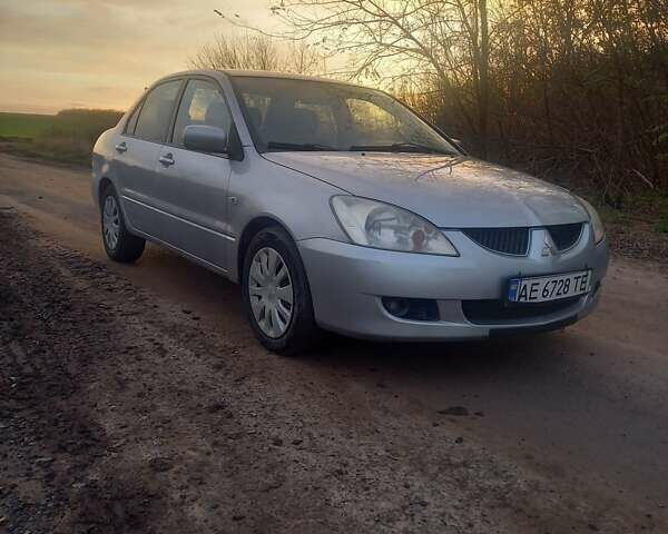 Сірий Міцубісі Lancer, об'ємом двигуна 1.6 л та пробігом 280 тис. км за 3800 $, фото 1 на Automoto.ua