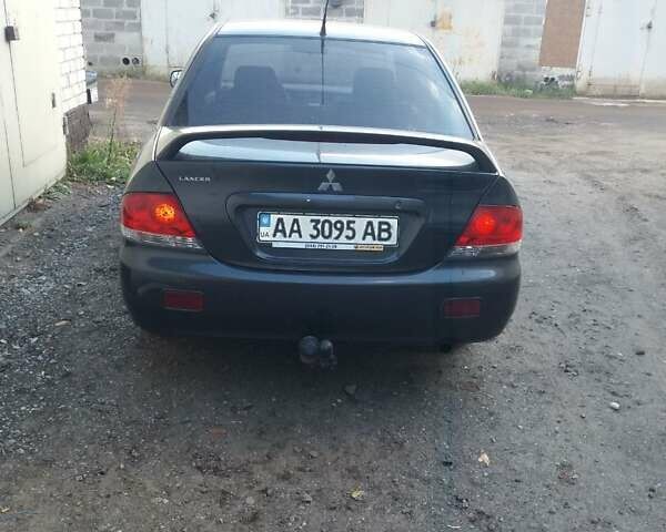 Сірий Міцубісі Lancer, об'ємом двигуна 1.58 л та пробігом 531 тис. км за 2828 $, фото 4 на Automoto.ua