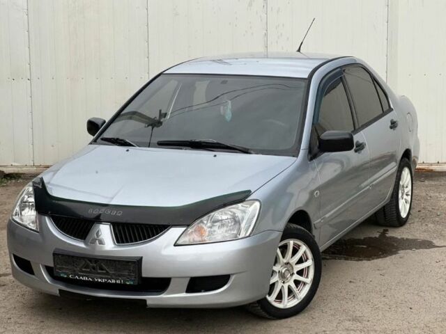 Серый Мицубиси Лансер, объемом двигателя 1.6 л и пробегом 178 тыс. км за 3200 $, фото 1 на Automoto.ua