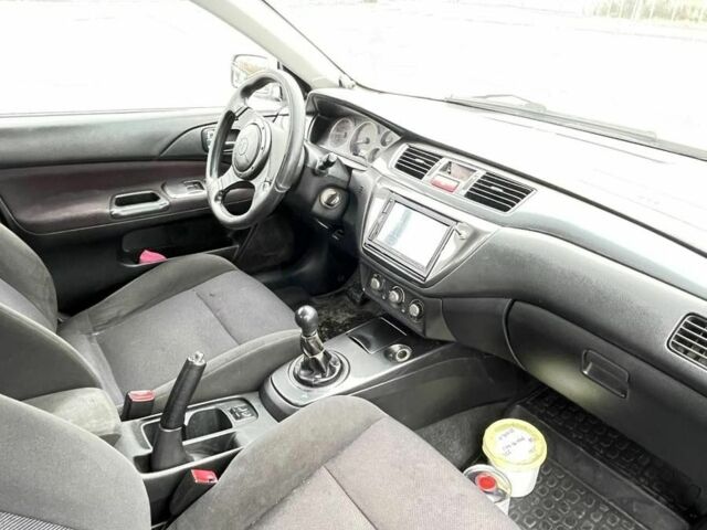Сірий Міцубісі Lancer, об'ємом двигуна 2 л та пробігом 1 тис. км за 3500 $, фото 6 на Automoto.ua