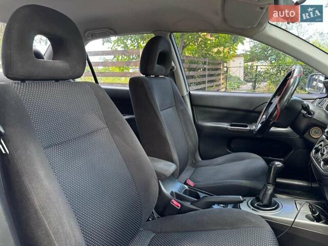 Серый Мицубиси Лансер, объемом двигателя 1.6 л и пробегом 196 тыс. км за 4490 $, фото 24 на Automoto.ua