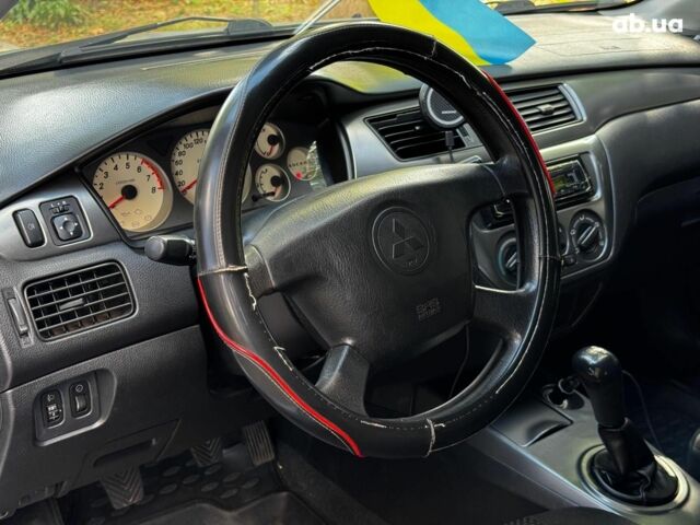 Мицубиси Лансер 2005 в Киеве на Automoto.ua Серый Мицубиси Лансер, объемом двигателя 1.6 л и пробегом 196 тыс. км за 4490 $, фото 13 на Automoto.ua