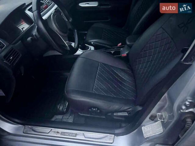 Сірий Міцубісі Lancer, об'ємом двигуна 2 л та пробігом 187 тис. км за 4600 $, фото 9 на Automoto.ua