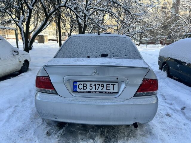 Серый Мицубиси Лансер, объемом двигателя 1.6 л и пробегом 1 тыс. км за 2500 $, фото 3 на Automoto.ua
