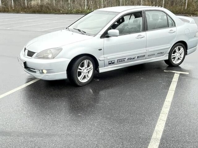 Сірий Міцубісі Lancer, об'ємом двигуна 2 л та пробігом 1 тис. км за 3500 $, фото 3 на Automoto.ua