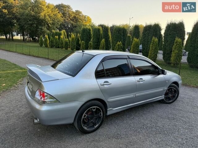 Сірий Міцубісі Lancer, об'ємом двигуна 2 л та пробігом 360 тис. км за 3400 $, фото 7 на Automoto.ua