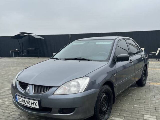 Сірий Міцубісі Lancer, об'ємом двигуна 1.6 л та пробігом 231 тис. км за 3500 $, фото 2 на Automoto.ua