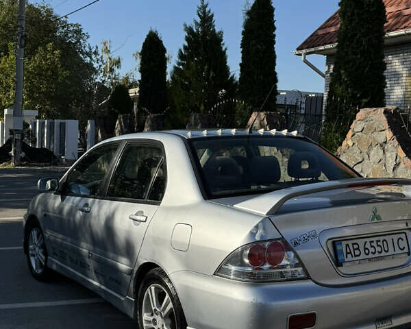 Сірий Міцубісі Lancer, об'ємом двигуна 2 л та пробігом 346 тис. км за 3200 $, фото 16 на Automoto.ua