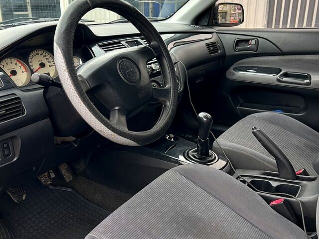 Сірий Міцубісі Lancer, об'ємом двигуна 1.6 л та пробігом 236 тис. км за 3800 $, фото 7 на Automoto.ua