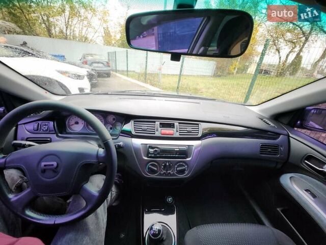 Серый Мицубиси Лансер, объемом двигателя 1.58 л и пробегом 293 тыс. км за 4000 $, фото 29 на Automoto.ua