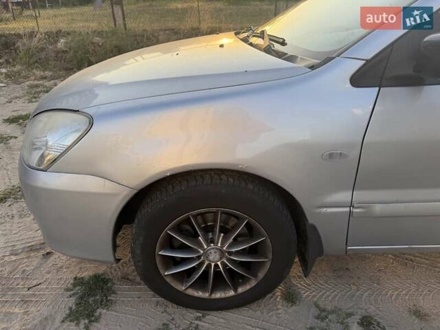 Серый Мицубиси Лансер, объемом двигателя 1.58 л и пробегом 176 тыс. км за 3200 $, фото 4 на Automoto.ua