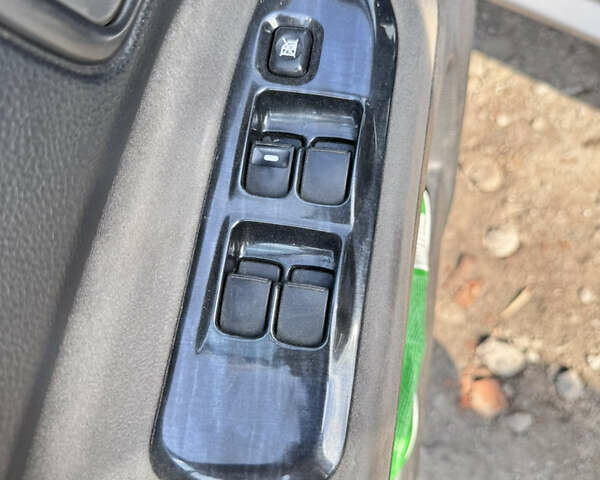 Сірий Міцубісі Lancer, об'ємом двигуна 1.58 л та пробігом 292 тис. км за 5000 $, фото 26 на Automoto.ua