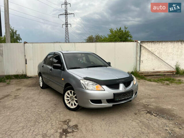 Сірий Міцубісі Lancer, об'ємом двигуна 1.6 л та пробігом 310 тис. км за 3350 $, фото 8 на Automoto.ua