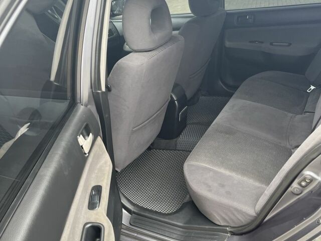 Сірий Міцубісі Lancer, об'ємом двигуна 1.6 л та пробігом 231 тис. км за 3500 $, фото 7 на Automoto.ua