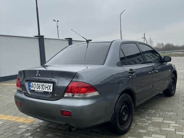 Сірий Міцубісі Lancer, об'ємом двигуна 1.6 л та пробігом 231 тис. км за 3500 $, фото 3 на Automoto.ua