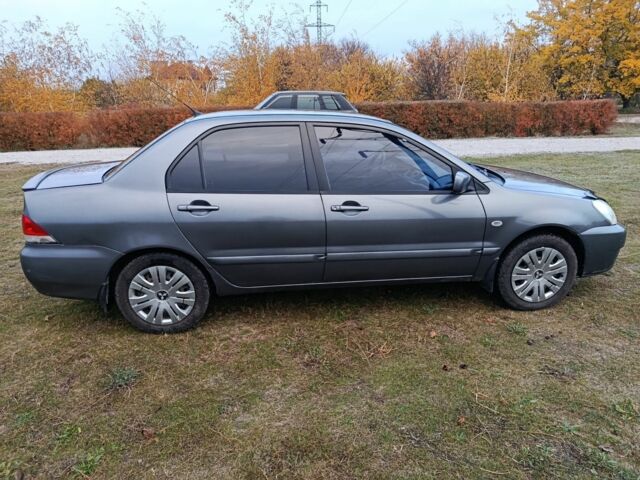 Міцубісі Lancer 2005 у Кам'янське (Дніпродзержинськ) на Automoto.ua Сірий Міцубісі Lancer, об'ємом двигуна 1.6 л та пробігом 220 тис. км за 4100 $, фото 8 на Automoto.ua
